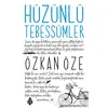 Hüzünlü Tebessümler - Özkan Öze - Uğurböceği Yayınları