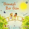 Güneşli Bir Gün - Anna Milbourne - TÜBİTAK Yayınları